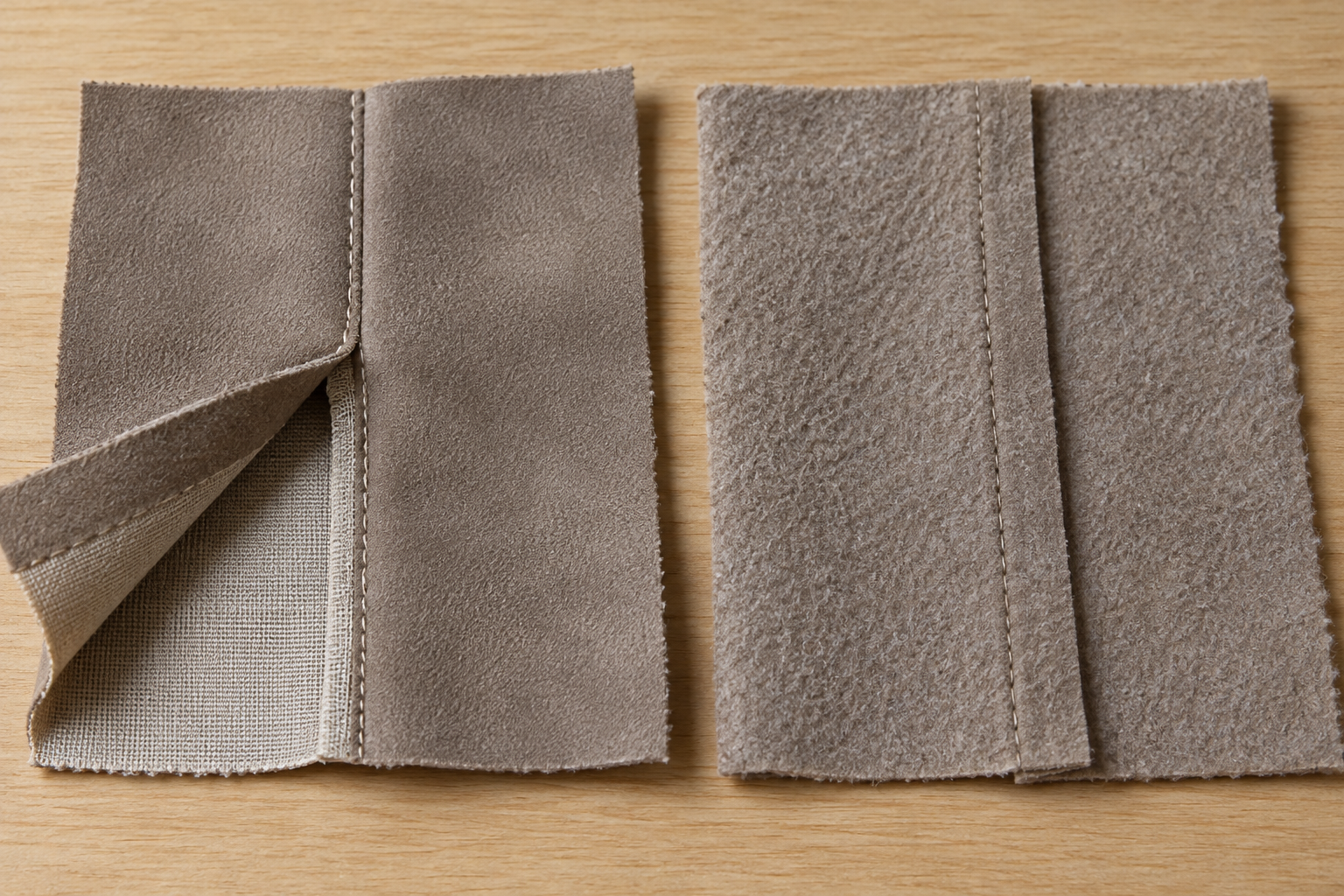Two synthetic-suede offcuts show different sample seam arrangements for comparison